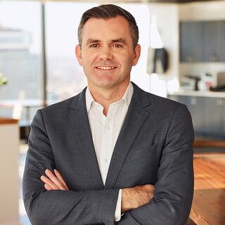 man with arms crossed