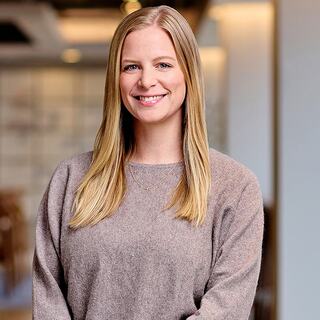woman standing with arms crossed