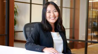 woman sitting smiling