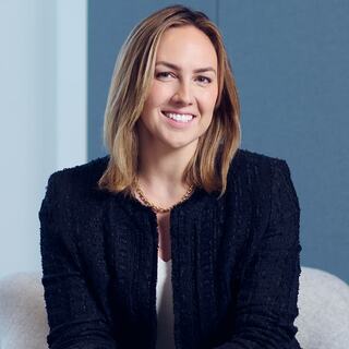 woman sitting smiling