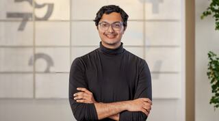 man with arms crossed