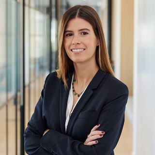 woman standing with arms crossed
