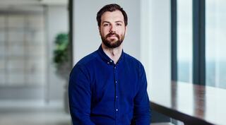 man with arms crossed