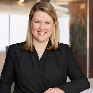 woman sitting smiling